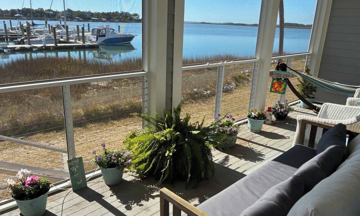 Folly Beach Condo | 1st-floor riverfront condo w/spectacular river views, balcony, and central AC