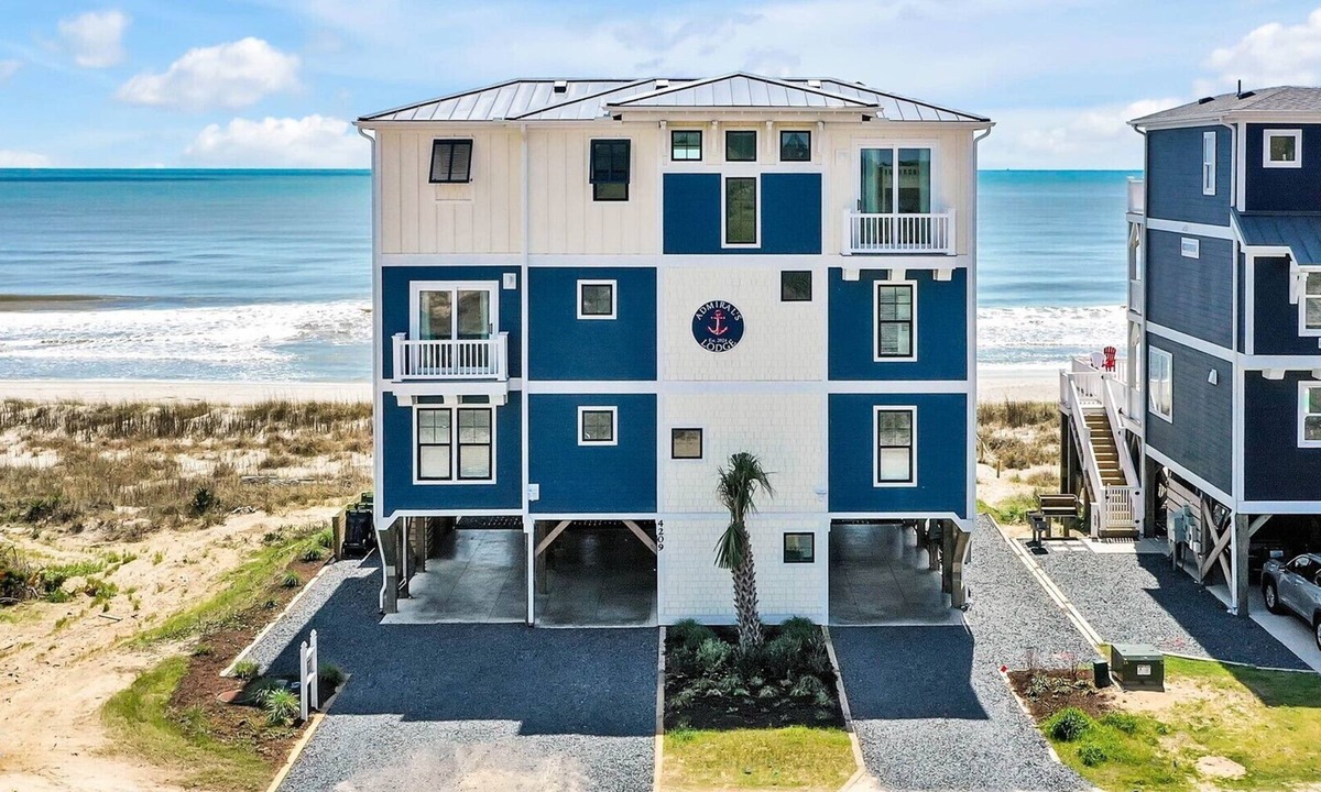Oak Island House | Admirals Lodge: Spacious 13-bedroom oceanfront retreat in Oak Island for 30 guests.