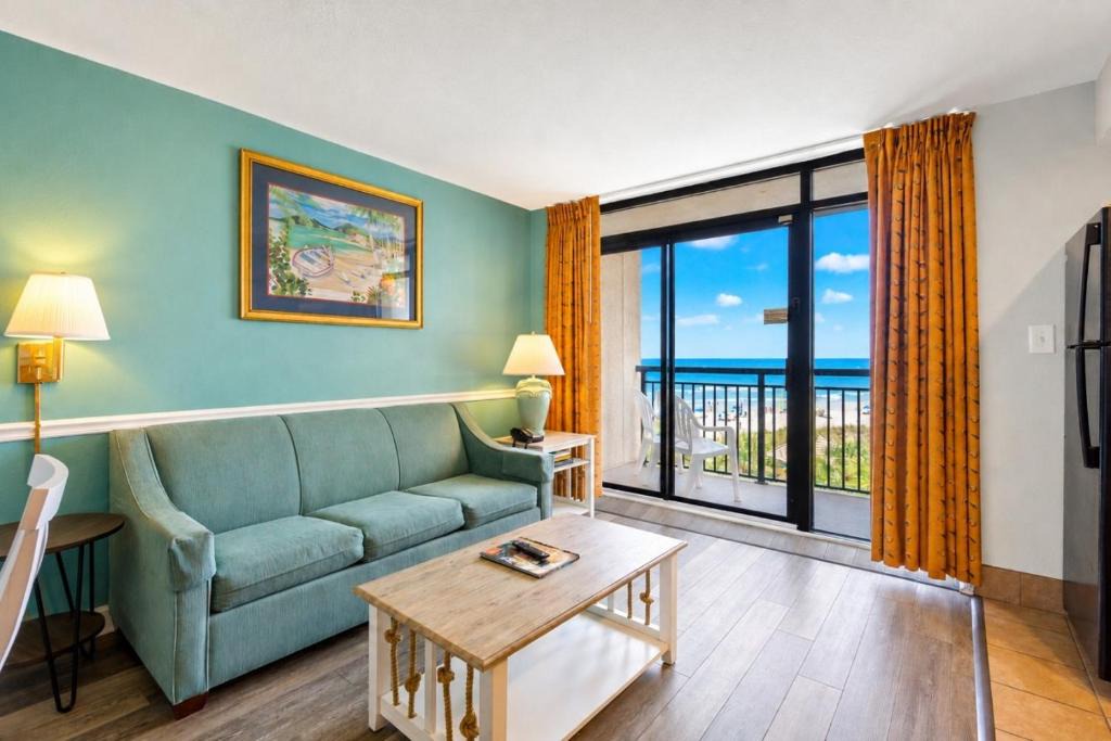 Windy Hill House | Beach Cove Resort Unit 312 with Direct Oceanfront Balcony