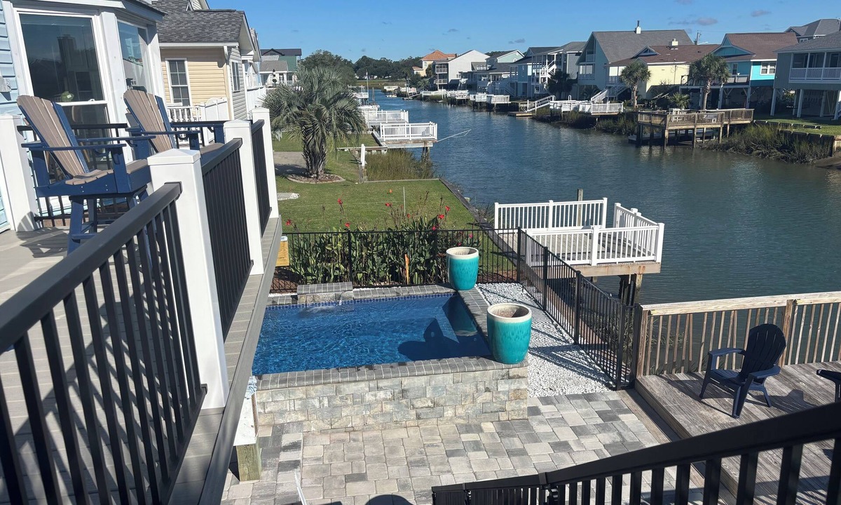 North Myrtle Beach House | Beautiful home on the channel in Cherry Grove with POOL and Hot Tub
