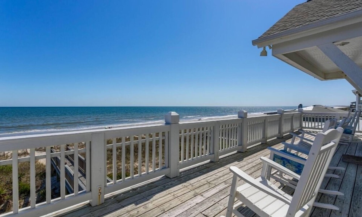 Holden Beach House | Bee Holden - Enjoy the beautiful Atlantic ocean from the deck while relaxing on the porch swing