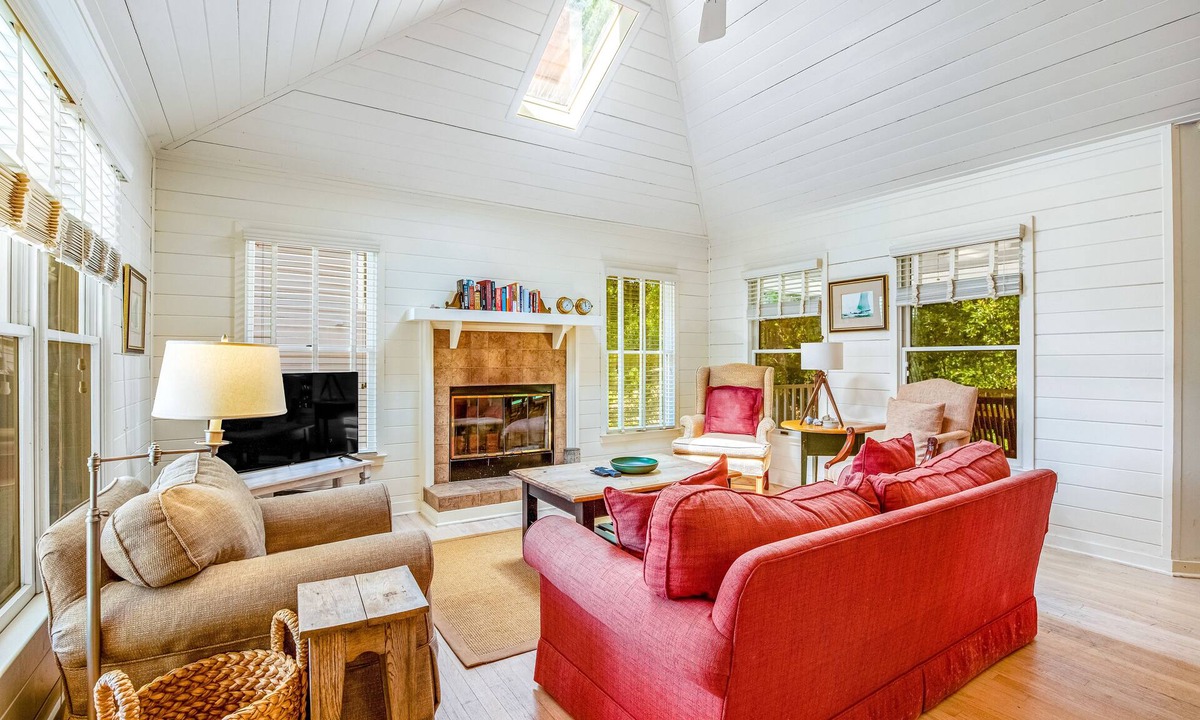 Pelican Bay House | Casual cottage w/screened porch & shared pool - walk to the beach