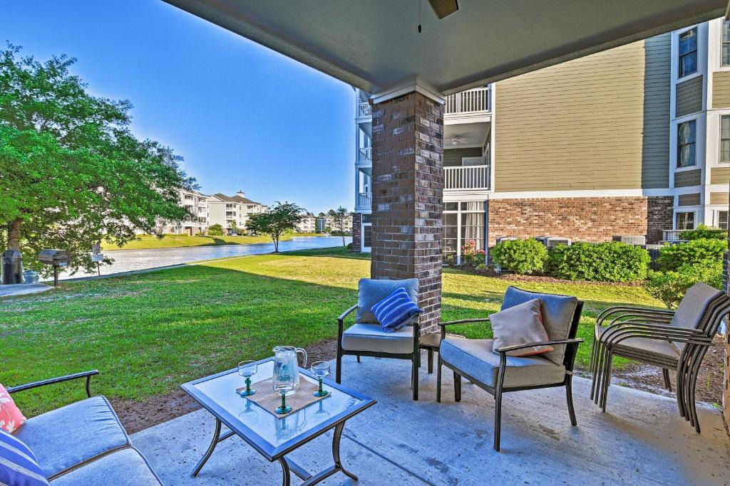 Central Myrtle Beach Apartment | Condo with Patio and Pool Access about 2 Miles to Beaches