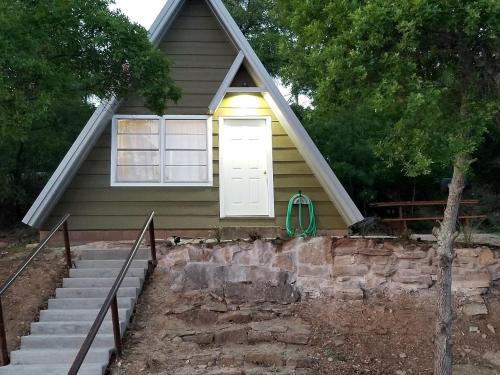 Cisco Ski Chalet | Cozy Lakefront A-Frame Cabin with Dock Access & BBQ Near Lake Cisco, TX