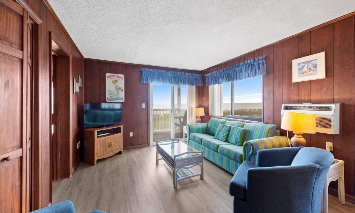 Crescent Beach Condo | Cozy oceanfront condo, rustic wood paneling and fully equipped kitchen | Sun Villas - A-2