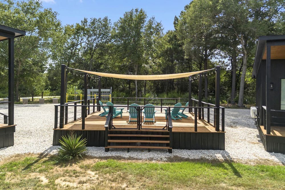 Waller Cabin | Elegant Tiny Home Resort with Heated Pool & Goats near Houston, Hempstead Texas