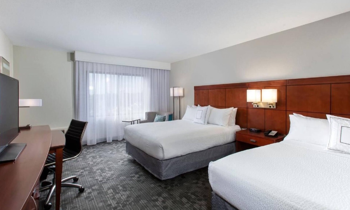 North Myrtle Beach Hotel | Explore Barefoot Landing then Relax in Indoor Pool Retreat | 4 Rooms