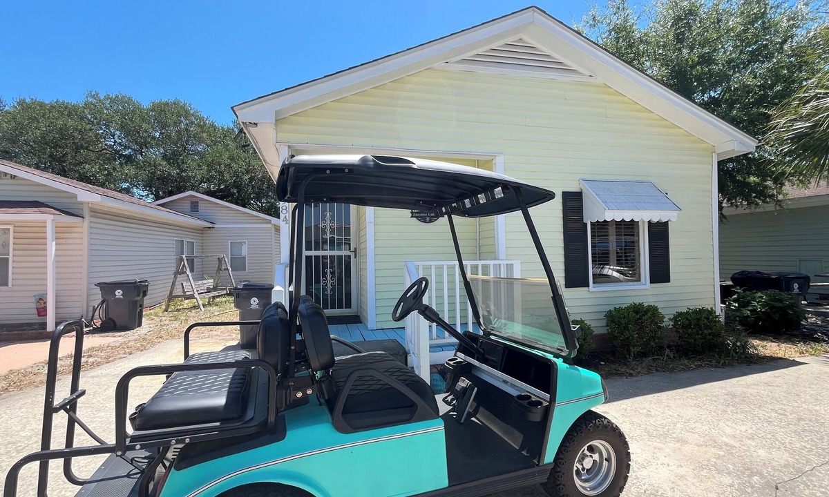 Garden City Cottage | Jacana Cabana: golf cart included with no pet fee!