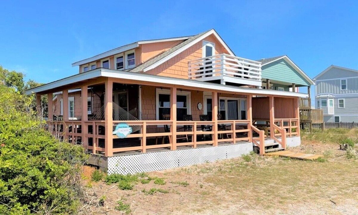 Kure Beach Cottage | Kure Cottage-Feel the uniqueness of this classic oceanfront Beach Cottage Vacation Rental in Kure Beach.