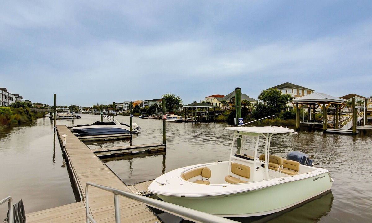 Carolina Yacht Landing Condo | Lakefront condo with private patio, pool, close to beach