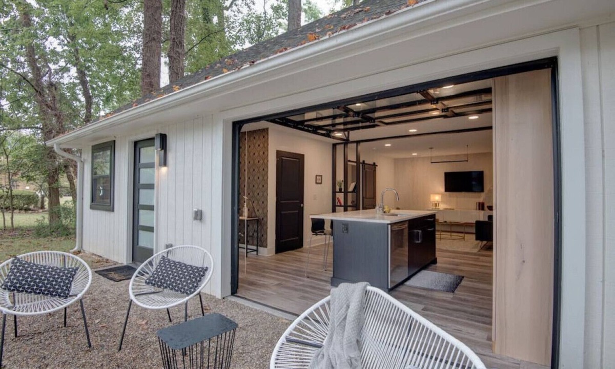 Charlotte House | Luxurious Guest House Retreat in Lower South End w/retractable glass garage door
