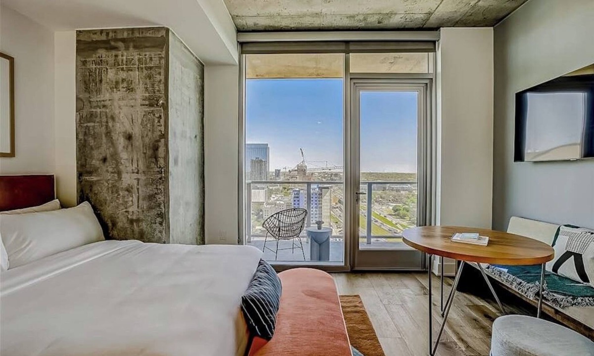 Rainey Street Historic District Apartment | Natiivo Austin studio - lake & skyline-view balcony, pool & gym - dogs OK