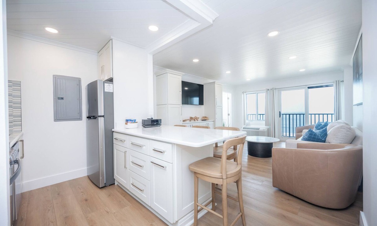 Northeast Virginia Beach Condo | Oceanfront 2 BR VA Beach Condo, Balcony Over Boardwalk, Sleeps 8, Pool & Sauna