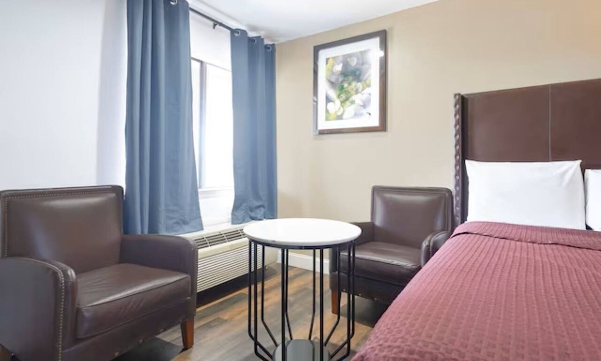 San Augustine Hotel | OYO Value: 2 Full Beds Non-Smoking, Great Location.