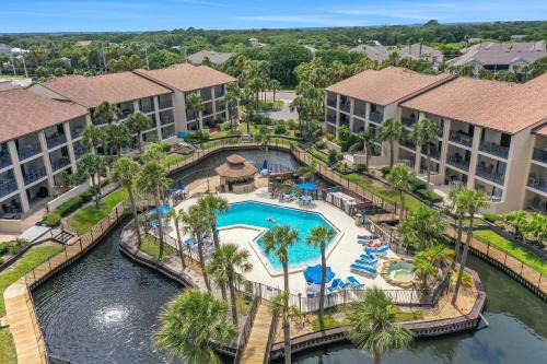St. Augustine Beach House | Recently updated resort condo with 2 pools, 2 balconies, ocean views, BBQ, & W/D