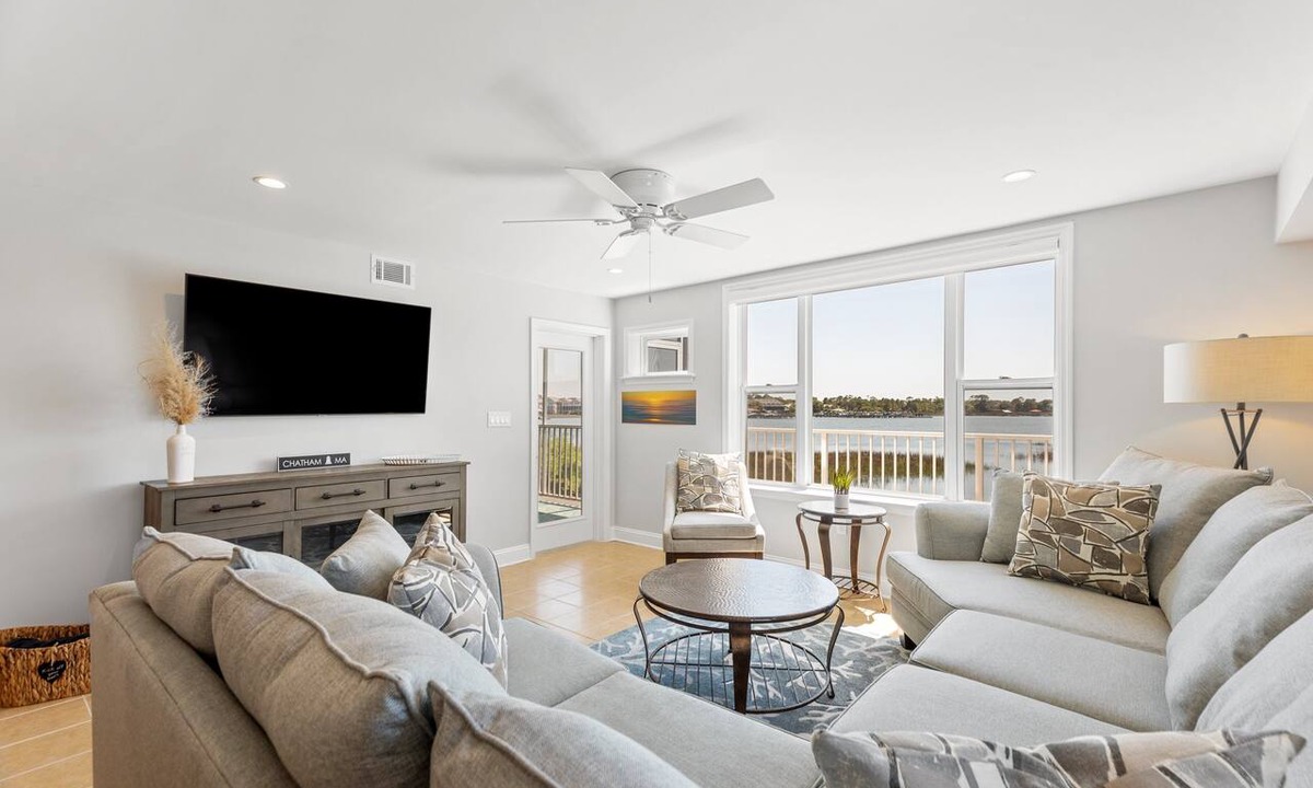 Folly Beach Condo | Riverfront condo, Screen porch - Short walk across bridge to beach, shops, and restaurants!