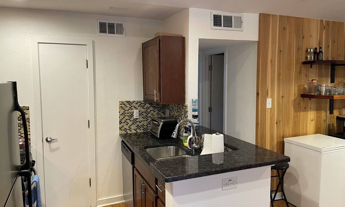 South Lamar Condo | Rustic Pool Front Condo with AC, High Speed Wifi in Beautiful Austin, TX