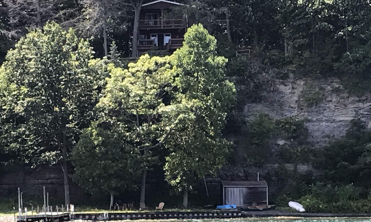 Rock Stream Cottage | Secluded Rustic Seasonal Seneca Lake Cottage Overlooking the Lake