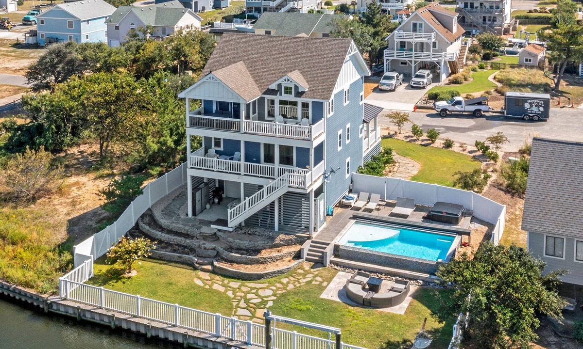 Nags Head House | Sound Living: Exquisite Canal-front home, Infinity Pool, Hot Tub, Elevator