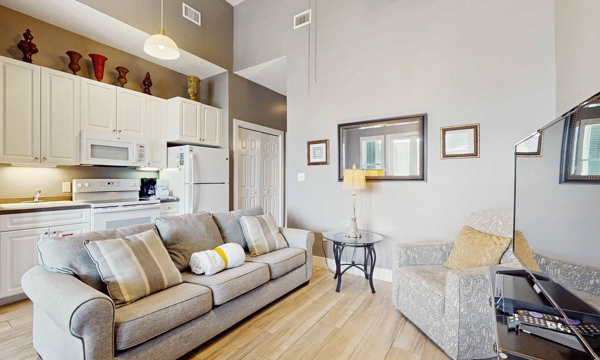 Gulf Place Apartment | Spacious condo with large living area, private balcony & shared pool