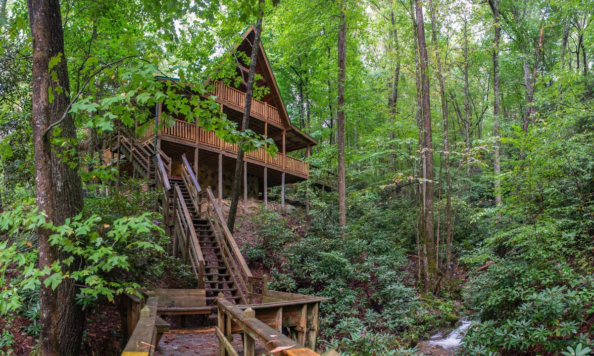 Smoky Mountains Cabin | Spacious creekside oasis with private hot tub, pool table, W/D, & fireplace