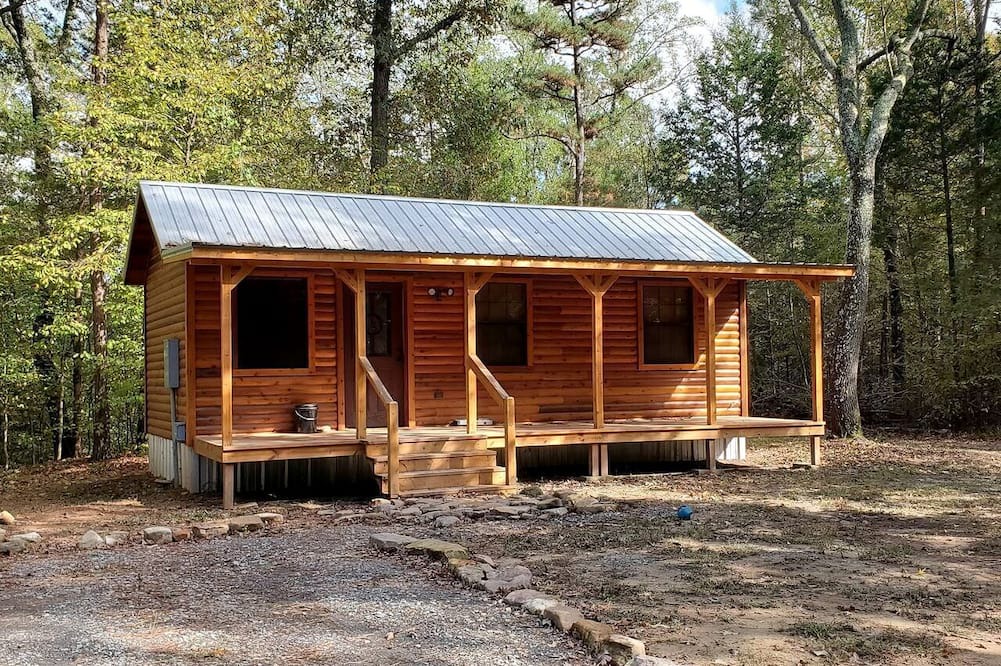 Pickens Cabin | Stunning Riverfront Log Cabin Nestled Amidst Trees in Nashoba, Oklahoma
