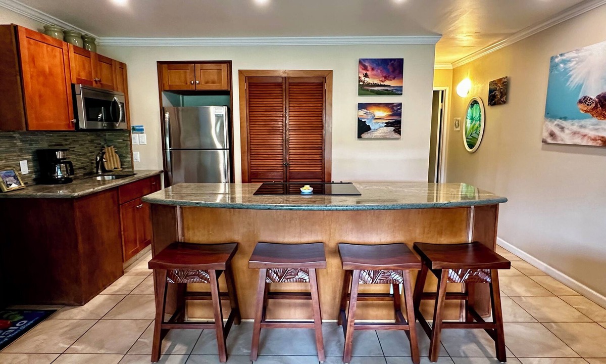 Kihei Condo | Summer DEALS! Partial Ocean View Condo with pool - just steps from the beach.