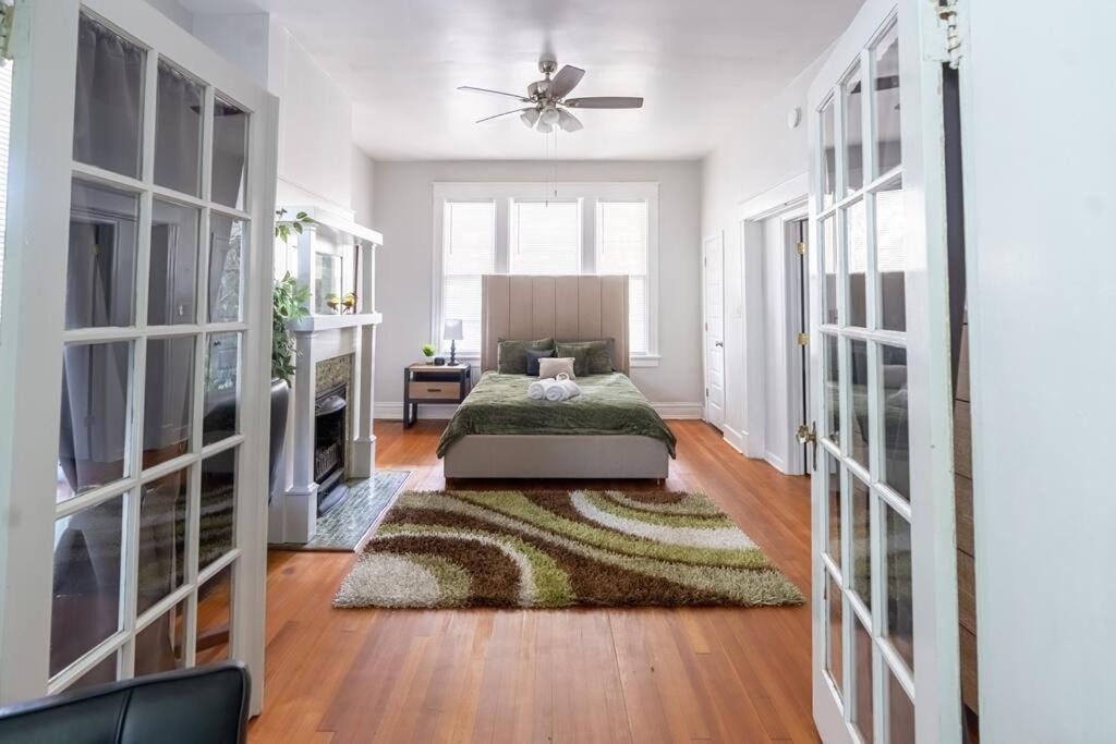 Woodland Heights Apartment | The Great Pink Lady with Huge Wrap Around Porch!