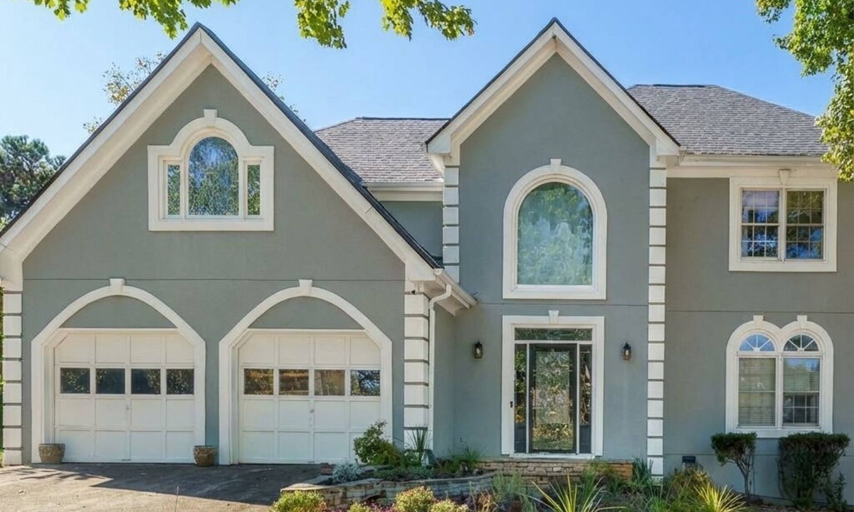 Cumming House | Traditional Home with Long Level Driveway offers media room and 4/2.5
