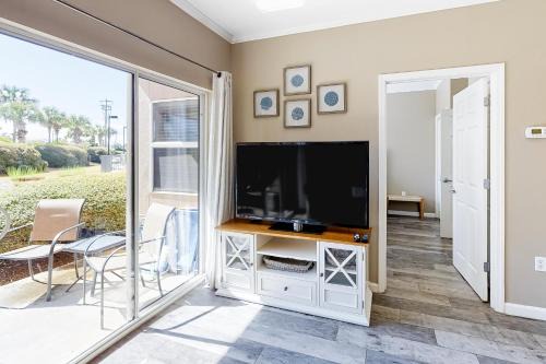 Frangista Beach House | Updated beachside condo with dual suites balcony & pool - walkable locale