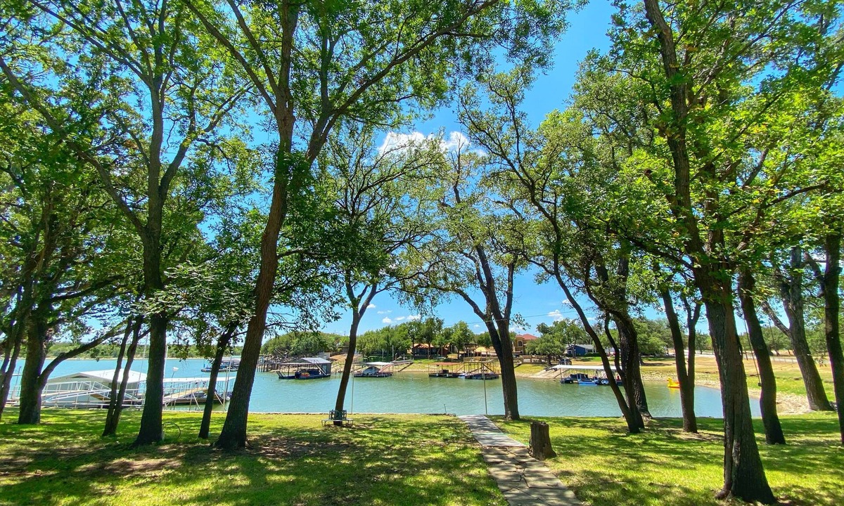 Brownwood House | Updated Shady Lakeside Retreat on Lake Brownwood with Large Boat Dock