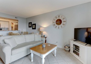 Oceanfront 2BR/2BA condo with pool, balcony, and beach access.