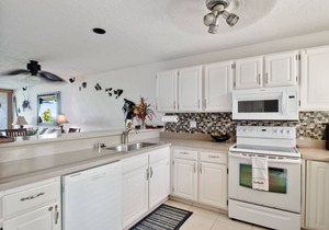 Relax and enjoy your own spacious private lanai with ocean & sunset views