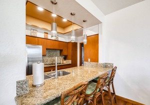 Third floor condo with ocean views, pool and hot tub access, and golf nearby