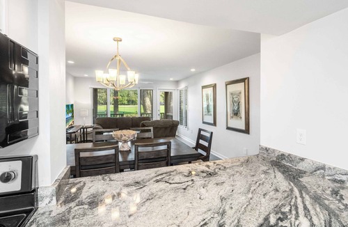 West Beach Village Condo | 1306 Fairway Oaks: 2BR, Pet Friendly, Golf Views, Short Walk to Beach
