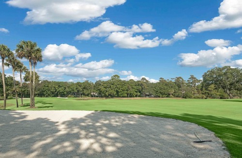 West Beach Village Condo | 1306 Fairway Oaks: 2BR, Pet Friendly, Golf Views, Short Walk to Beach