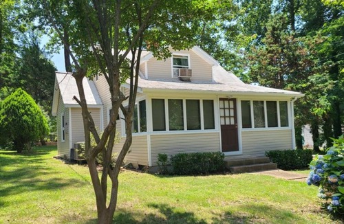 Calvert Beach-Long Beach House | 3-bedroom house in soothing Saint Leonard with AC for relaxing stays