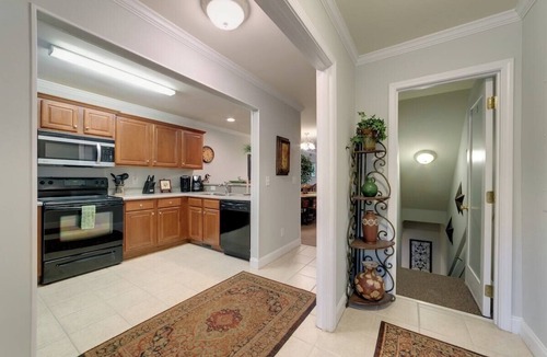 Helen Condo | 3BR Helen condo with 2 hot tubs, fireplace, riverfront deck