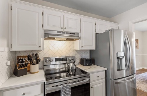 Greer House | 3BR Near DT Greer - Screened Porch + Fenced Yard
