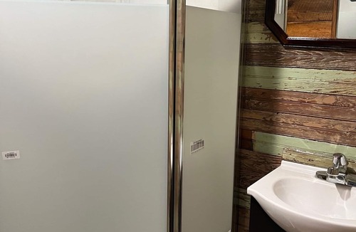 Ruffin Cabin | A Minimalist Fancy! A cute place to lay your head and take a short shower.
