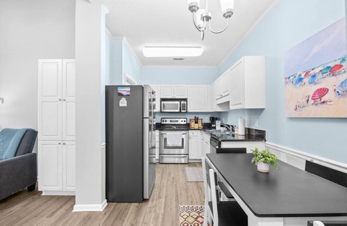 Vaught Apartment | A wave from it all < 1 mile to the beach!