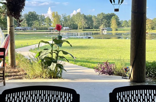 Andalusia House | Accessible lake-front 4 bedroom home with TONS of outdoor covered space!