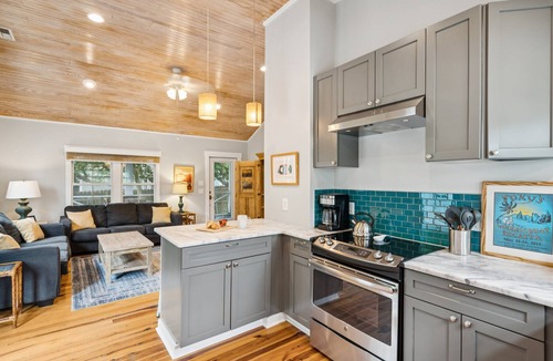 Folly Beach House | Adorable Dog Friendly Cottage - Stones Throw - Screened Porch - Fenced Yard - Steps to the Beach