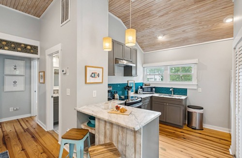 Folly Beach House | Adorable Dog Friendly Cottage - Stones Throw - Screened Porch - Fenced Yard - Steps to the Beach