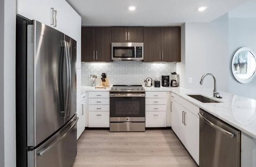 Woodmont Triangle Apartment | Ample Parking Space! Walk to Bethesda Station | Downtown Bethesda | by GLS