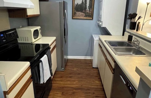 Auburn Condo | AU Condo Getaway Across From Vet School - Kitchen, Pools, Queen BR, Pets Welcome