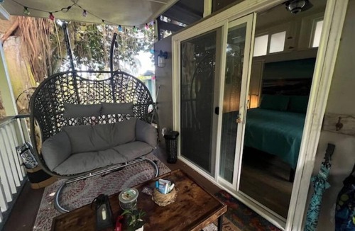 Kealakekua Cabin | Banyan Bungalow is nestled in the jungle and surrounded by a gorgeous landscape.