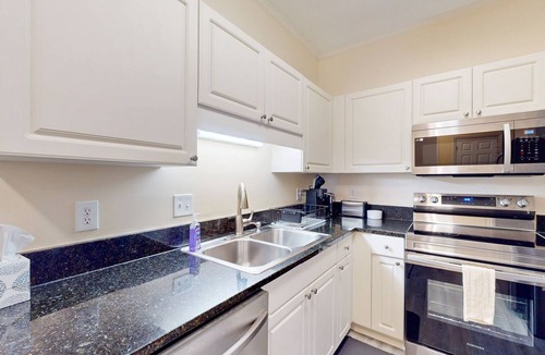Vaught Condo | Beach condo with pool, volleyball court, on-site golf, & gym - snowbird-friendly