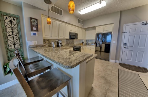 Thomas Drive Condo | Beachfront, all tiled unit. Beach chairs included Mar-Oct.