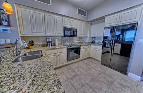 Thomas Drive Condo | Beachfront, all tiled unit. Beach chairs included Mar-Oct.